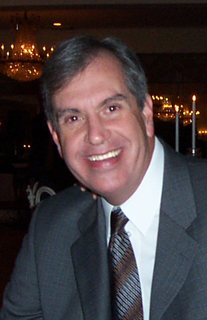 John L More, JD, President & CEO